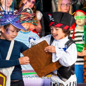 An image of pupils playing in fancy dress at Devonshire House School, an independent pre-prep and prep school based in London.