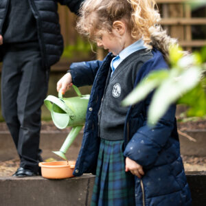An image of a student engaging in forest school at Devonshire House School, an independent pre-prep and prep school based in London.